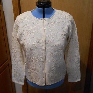 susan bristol .large.cream color hand embroidered with sequins